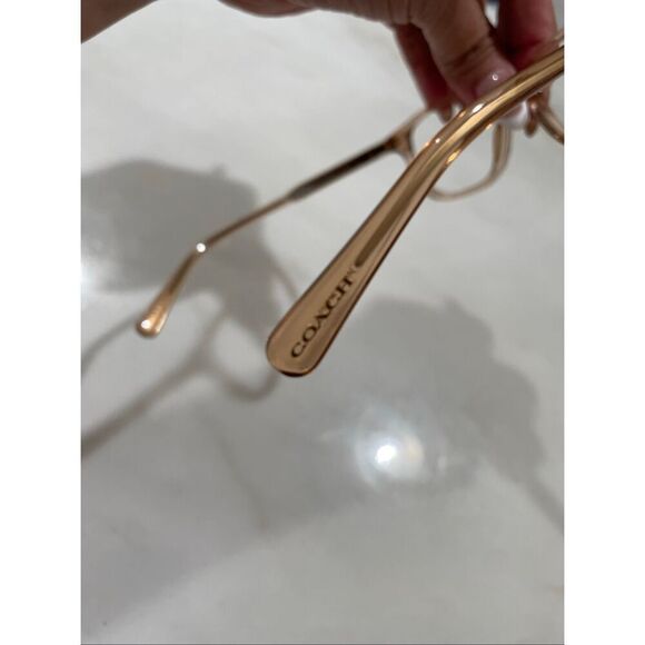 Coach Signature “C” print glasses frame in transparent peach main image 5